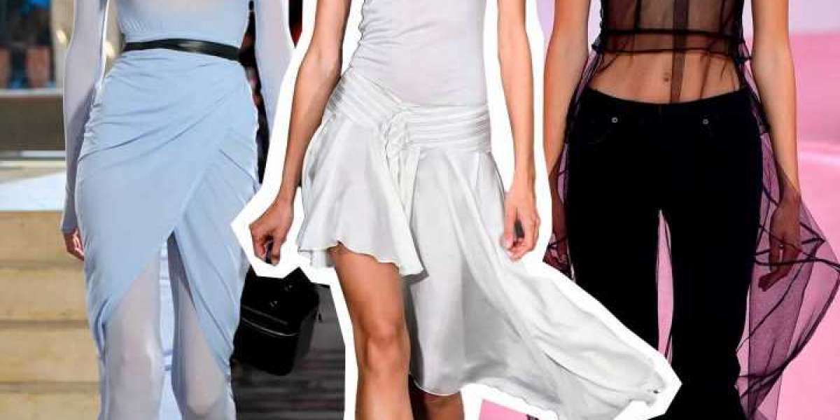 Quant's famous 'wet-look' Alexander McQueen Sale PVC mini raincoats